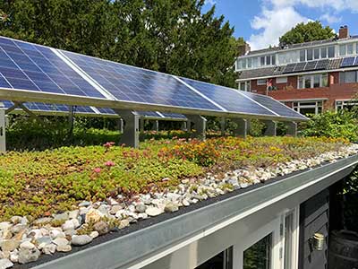 Rooftop with solar panels and a small garden